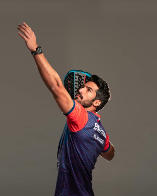 Padel coach in action - the four-stream revenue model (private, group, retreat, online) is how 2026 coaches grow income beyond hourly lessons