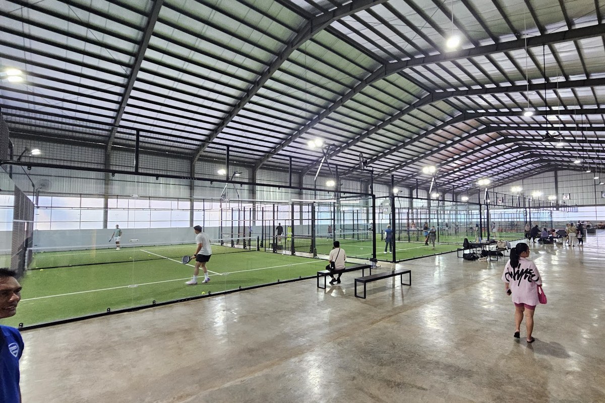 Padel courts with players inside the hall at Padel Hall Bogor south of Jakarta